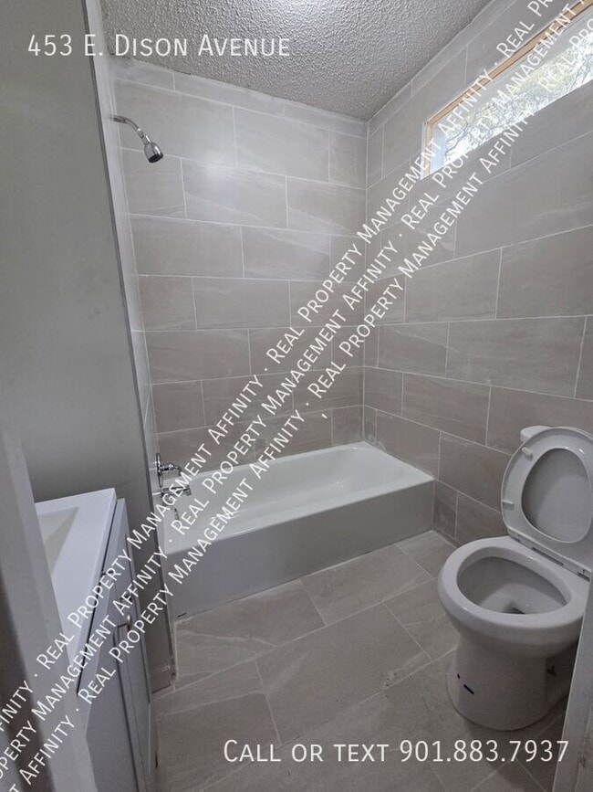 Building Photo - 453 E Dison Ave