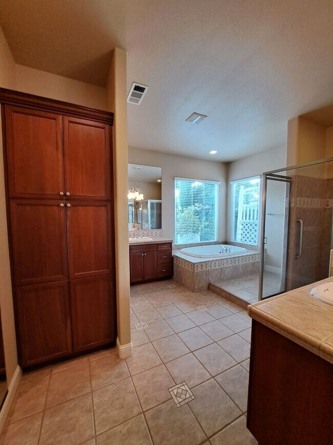 Building Photo - Custom Clovis Residence in Gated Community | Spacious Layout & 3-Car Garage!