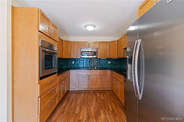 Building Photo - 6980 E Girard Ave