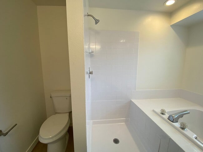 Building Photo - Stylishly Renovated Home with Private Back...
