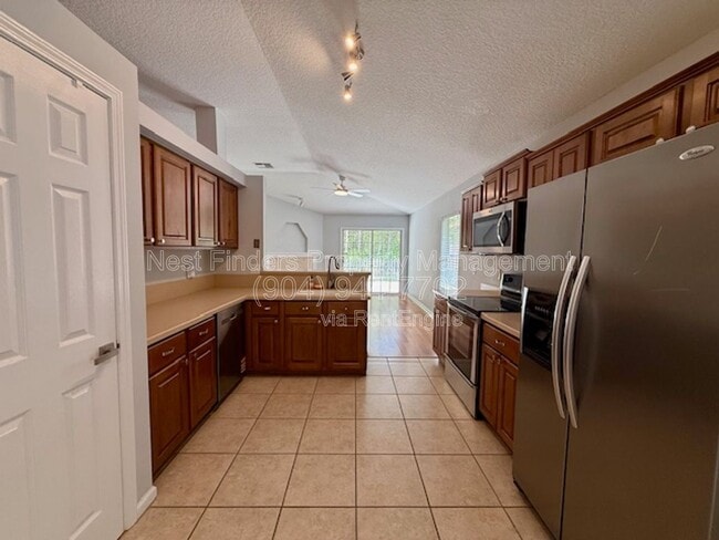 Building Photo - 4509 Deep River Way E