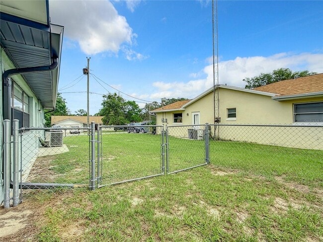 Building Photo - 5576 W Pine Cir