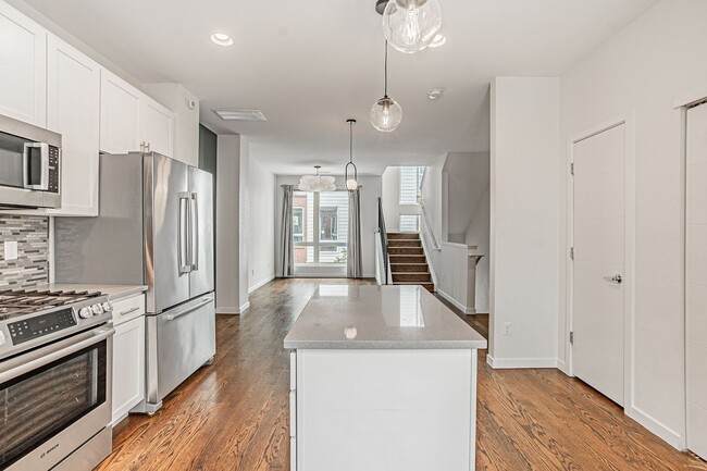 Building Photo - Modern 2BD, 3BA RiNo Townhome with Garage and Rooftop Deck