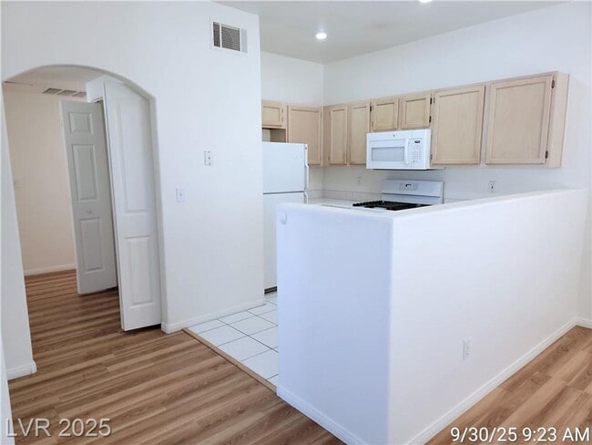 Building Photo - Cozy First-Floor End Unit with Fireplace &...