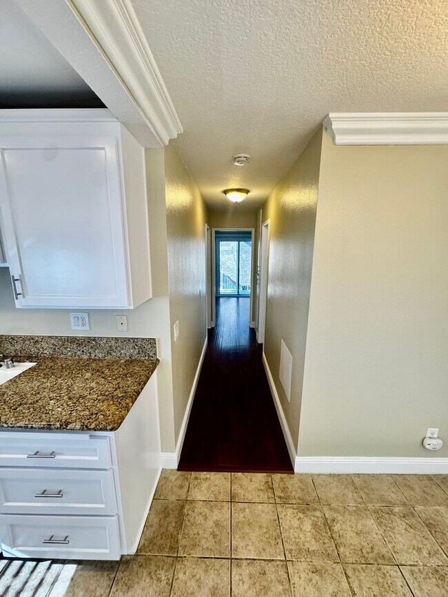 Building Photo - Updated 2nd Floor Corner Unit -3425 E. 15t...