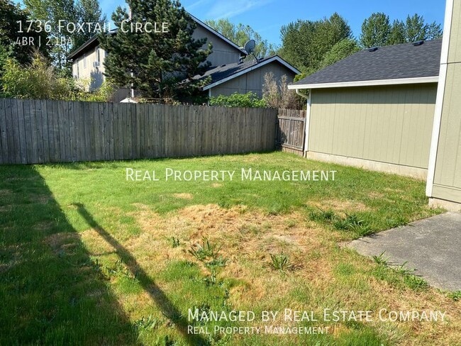 Building Photo - Woodland 4 Bed 2.5 Bath Home with Two Car ...