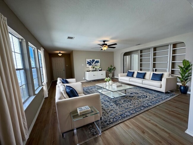 Building Photo - NEW PAINT, FLOORING, APPLIANCES & ROOF  | ...