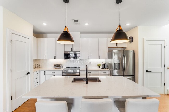 Building Photo - Chic Fully Furnished Condo with Private Retreat-Style Primary Suite