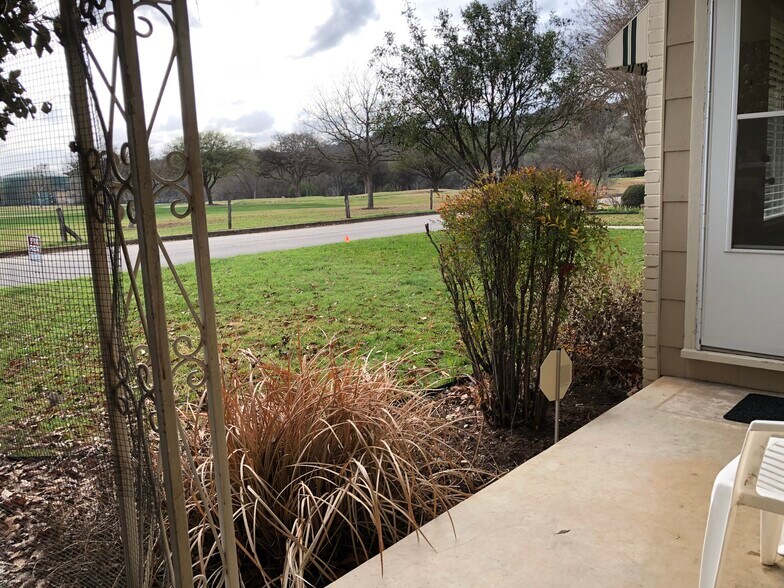 Front porch view of Land Park Golf Course and Comal River - 1034 Elizabeth Ave