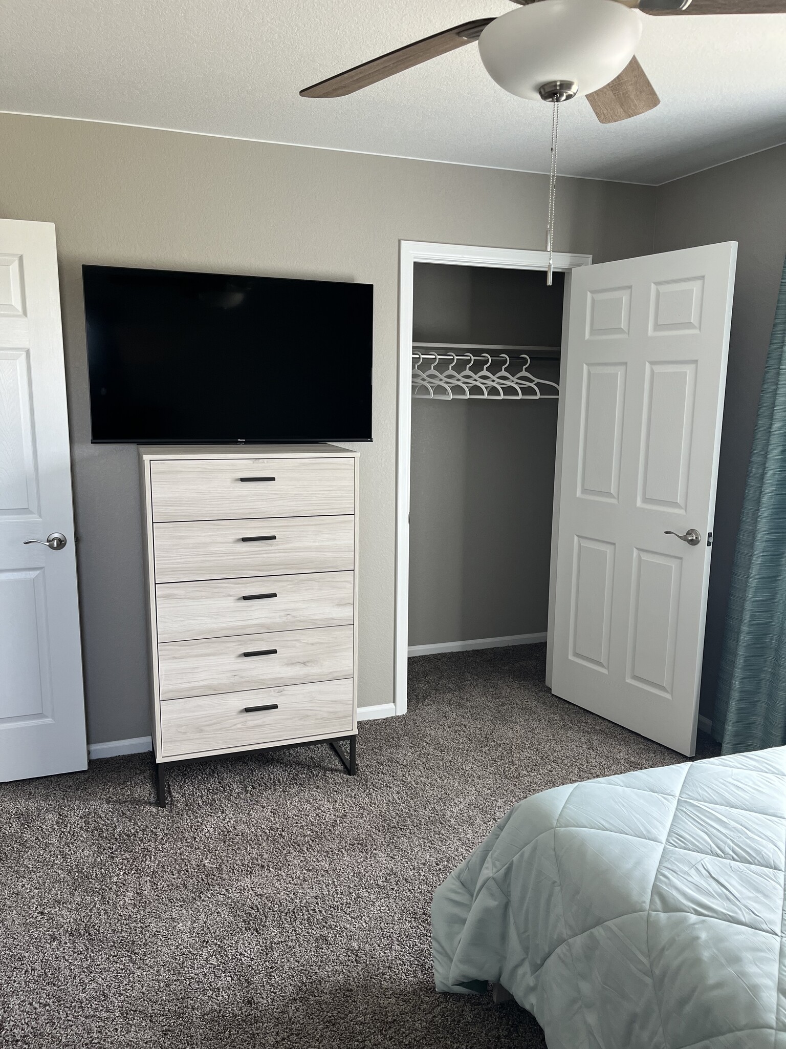 Upright Chest of Drawers, 50" Wall Mounted Smart TV, & Closet - 19909 E 61st Dr