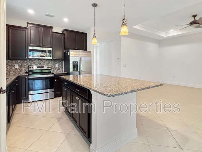 Building Photo - 9870 SW Trumpet Tree Cir