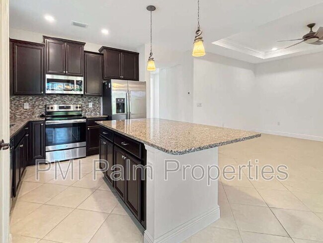 Building Photo - 9870 SW Trumpet Tree Cir