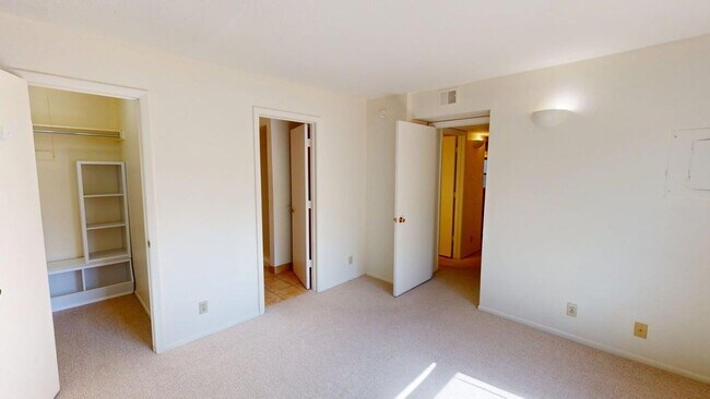 Building Photo - Light-Filled Upstairs Condo in a Prime Location