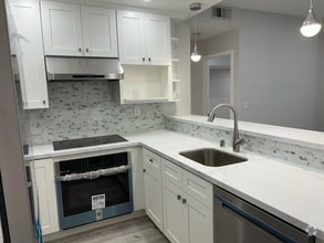 Building Photo - Completely renovated New hardwood floors.