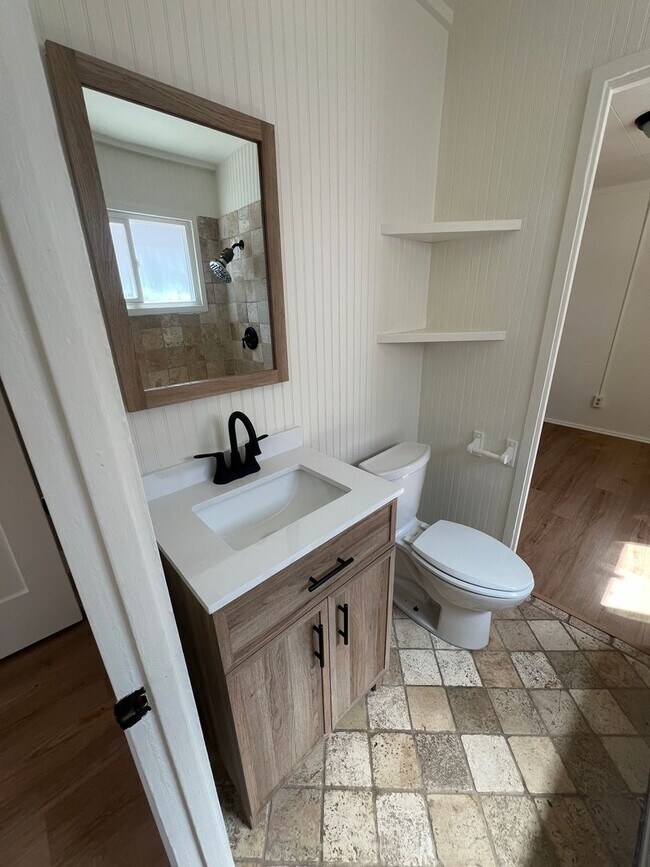 Building Photo - CHARMING! Remodeled 2 Bedroom home with storage and yard