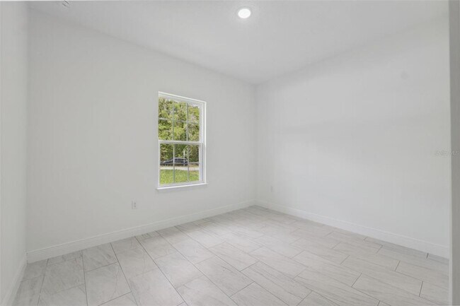 Building Photo - 10089 N Athenia Dr