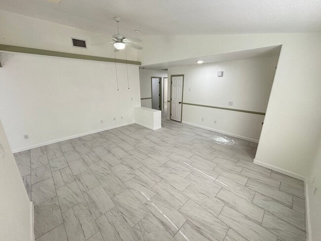 Building Photo - This inviting single-story home boasts a s...