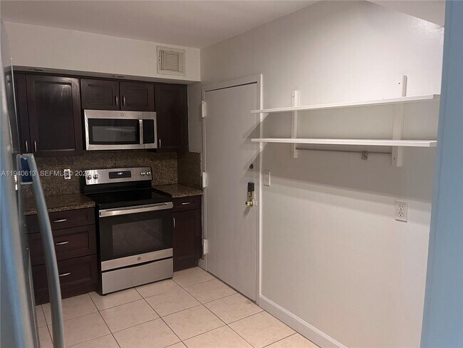 Building Photo - 5750 Collins Ave