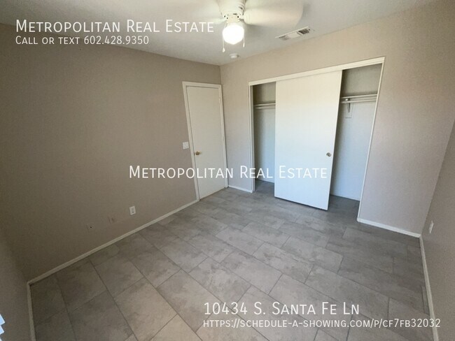 Building Photo - 10434 S Santa Fe Ln