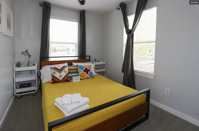 Upstairs bedroom (pictured) enjoys natural light and views of the Utah State Capitol & SLC hillside - 584 N 8th W