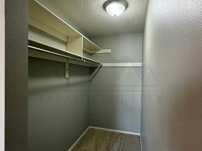 Building Photo - Single-Level 3-Bedroom Townhome with Primary Suite & Attached Garage