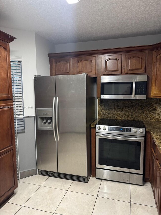 Building Photo - 7045 NW 173rd Dr