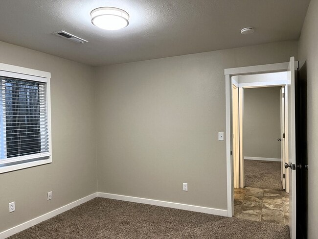 Building Photo - Newley updated 3-bedroom home features fen...