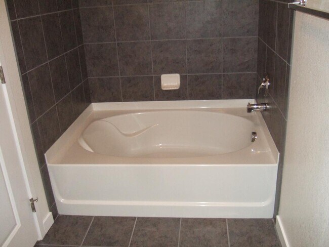 Building Photo - "Spacious 3-Bedroom Denver Condo with Cozy Fireplace & Modern Comforts!"