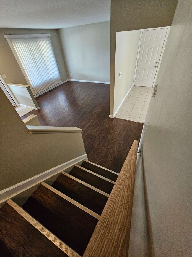 Building Photo - Clean 3-Bedroom Tri-Level, 1.5 Bath with Updated Kitchen, Great Room, Fireplace & Private Backyar...