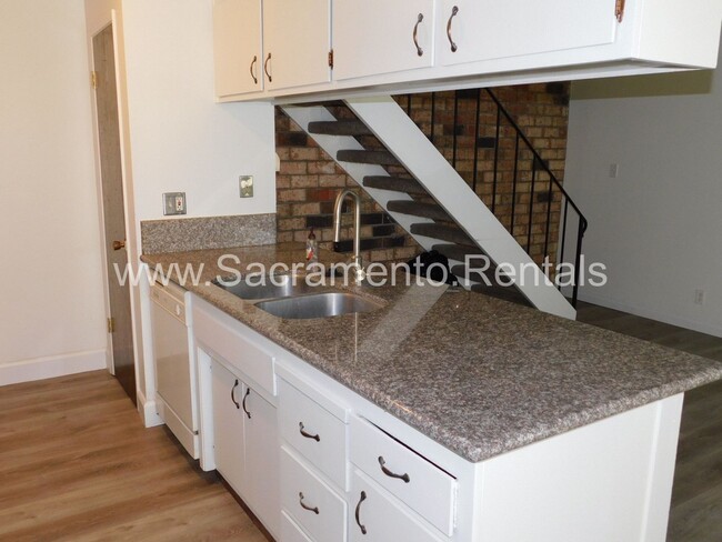 Building Photo - Affordable 2bd/1ba Fourplex with Garage ne...