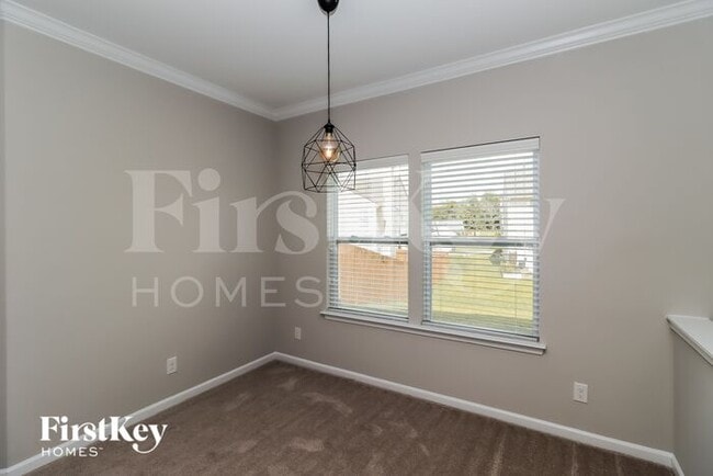 Building Photo - 5695 Saint Adriens Way