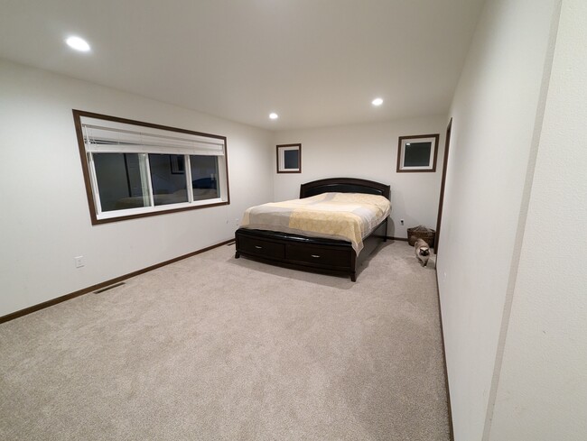 Enormous Master Bedroom with east facing window and master bath and large walk in closet - 5227 11th St W