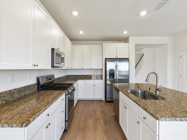 Building Photo - The Cypress - Large and Luxurious 2 Story with 4 Bedrooms, 3 Car Tandem Garage and fully fenced y...