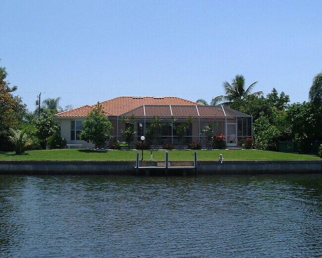 Building Photo - Short Term Rental ** Available 11/1/25 ** 3 Bed/2 Bath Pool Home ** Punta Gorda Isles** $7,500/mo