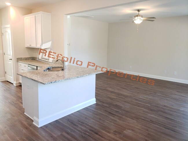Building Photo - Charming 4 Bedroom, 2.5 Bath, 2-Car Garage...