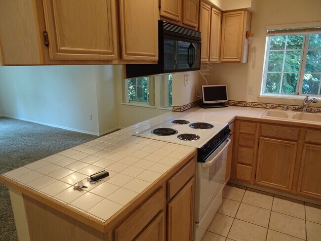 Building Photo - Modern 2-Bedroom Condo in Bellevue’s Merce...