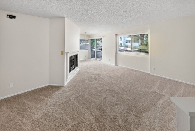 Building Photo - ADORABLE 3+2 CORNER UNIT & 2-CAR GARAGE!