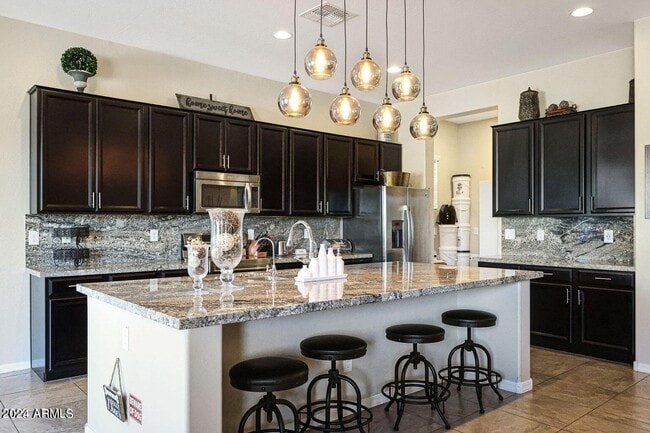 Building Photo - 9422 W Donald Dr