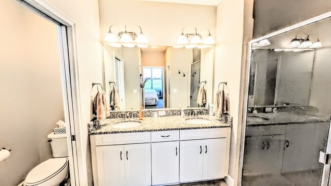Building Photo - Seasonal/short term turnkey furnished Incredible 2/2 with den ground floor condo in resort Esplan...