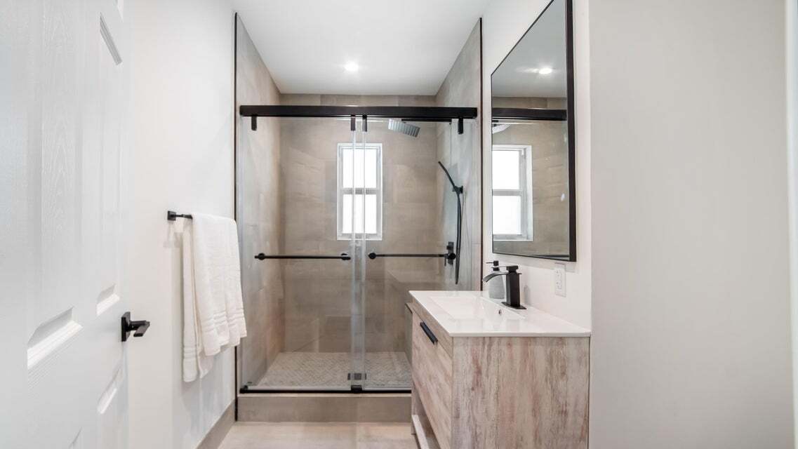 Bathroom facing east. - 121 George Bush Blvd