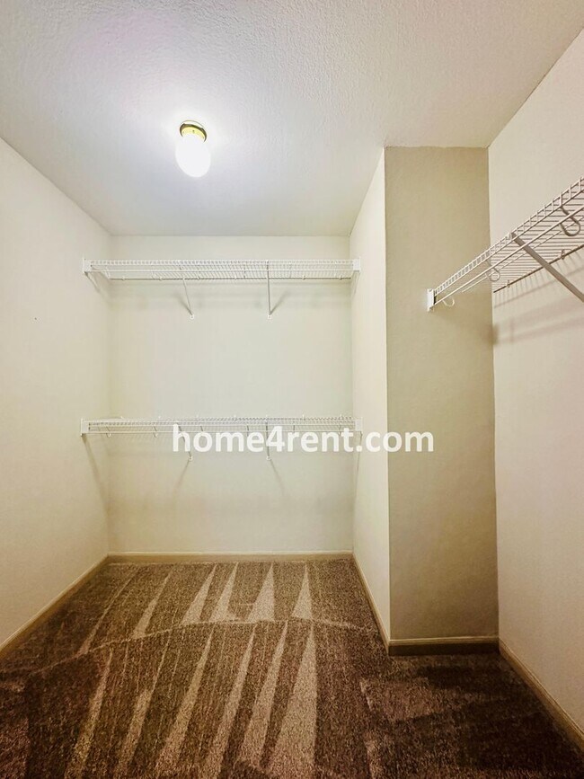 Building Photo - Maintenance FREE, Ranch Style Townhome w/ ...