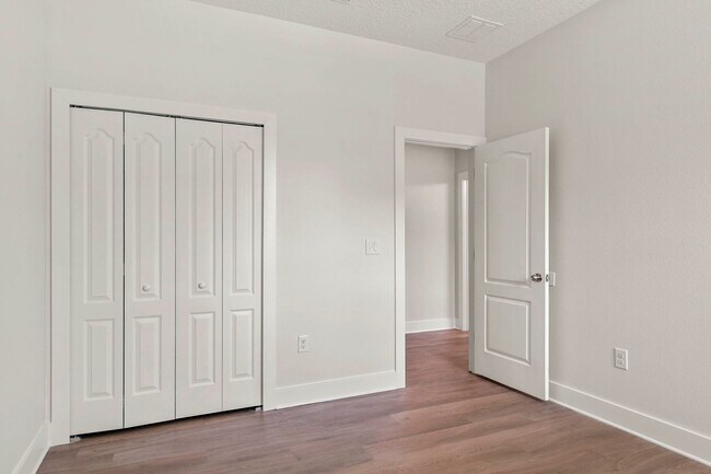 Building Photo - Expansive 4 bedroom, 3 bath remodeled home in gated community