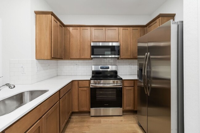 Building Photo - 6 Weeks Free! Brand-New 2-Story Townhome with Private Yard & 2-Car Garage