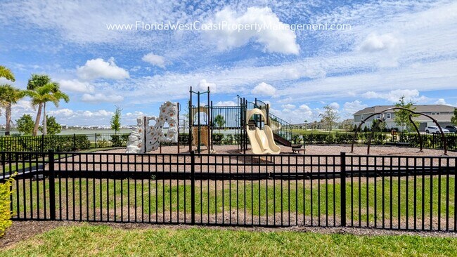 Building Photo - EXCEPTIONAL AND SPACIOUS FURNISHED TOWNHOME WITHIN WATERSIDE- NAUTIQUE!