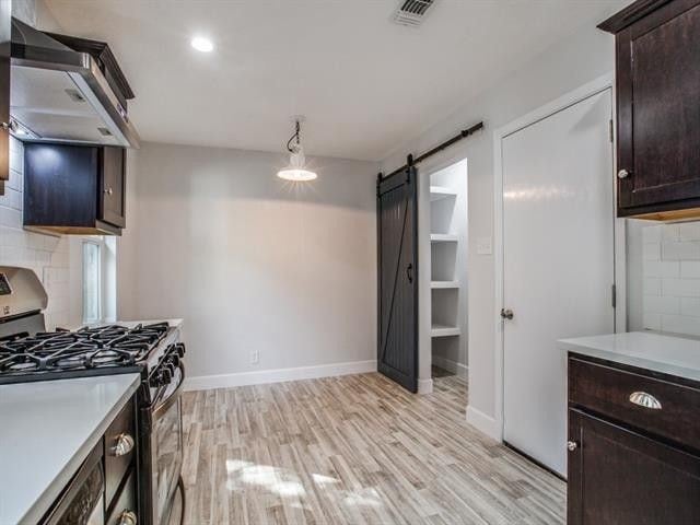 Small Nook Eat-In and Pantry; Door to Garage - 301 NW Wintercrest Rd