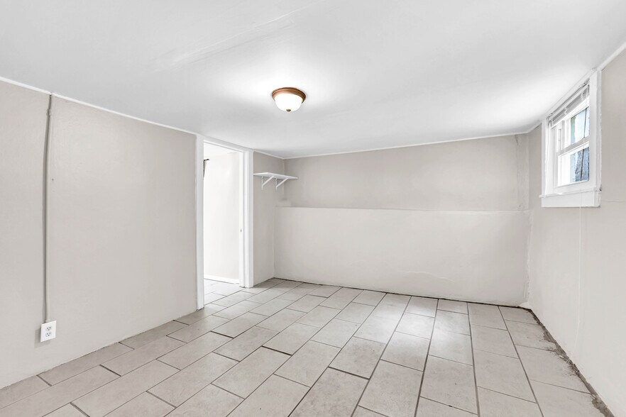 Shelving throughout home for storage. - 1 Proctor Dr