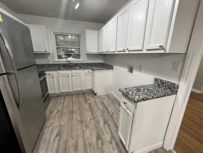 Building Photo - COMING SOON: Classic charm, peaceful living, your Forest Park retreat awaits in this spacious 3-b...