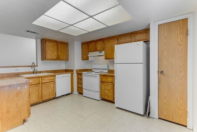 Building Photo - Charming 2 Bed, 2 Bath Condo with Fireplace & Balcony! 89011