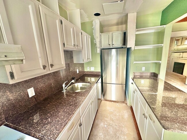 Building Photo - RENOVATION PREVIEW - Astonishing Adams Mor...