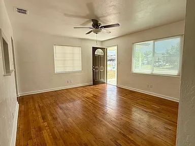 Building Photo - Charming Centrally Located Home | Wood Floors + Fenced Yard